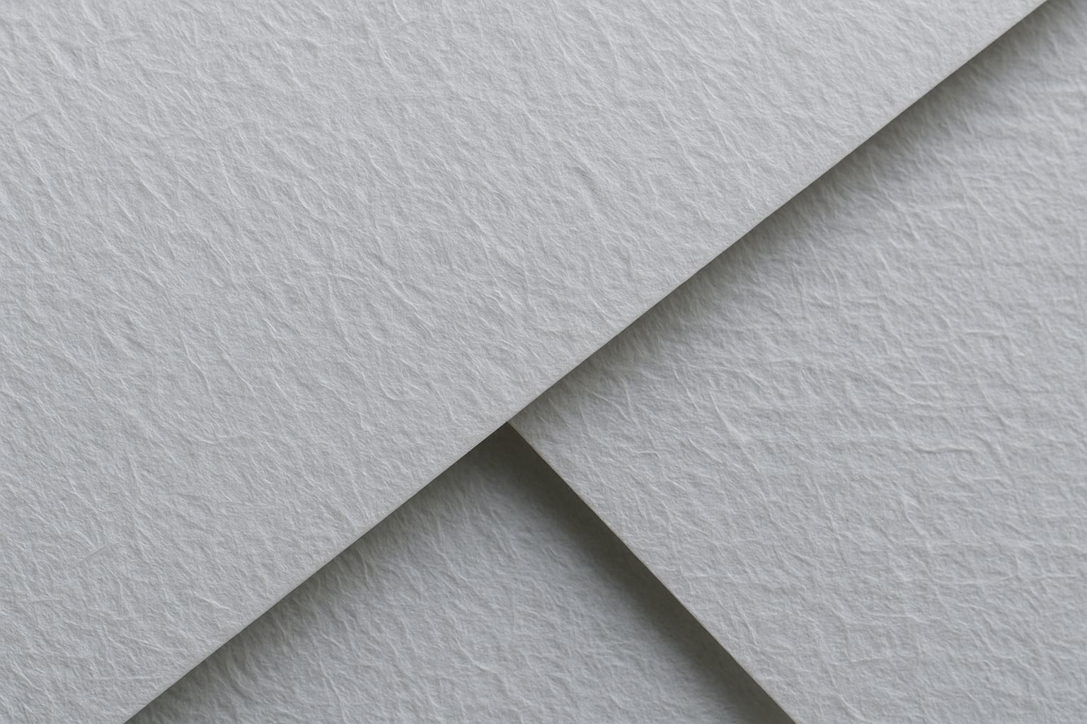Paper grain at close range. Where the law is thin, the questions have to be thicker.