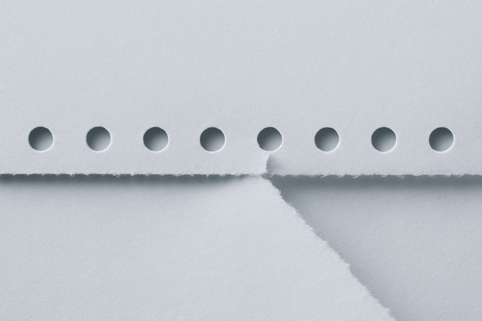 A perforated tear strip. A report works when it detaches one clean claim from everything else.